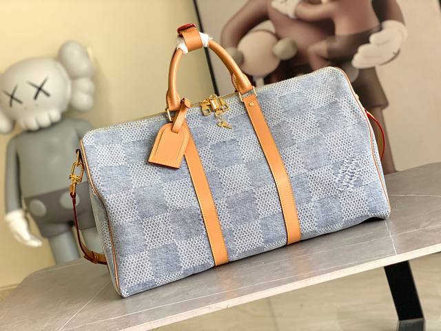 M40739 This Keepall Bandouli Re 50 Travel Bag Features A Cartoon Version Of The
