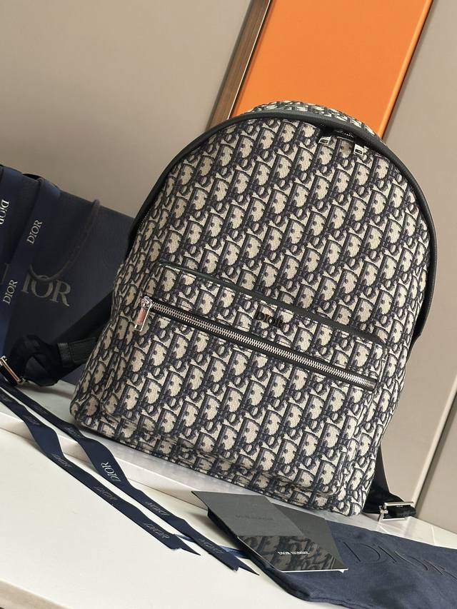 Large Black Label, This Rider Backpack Features A Minimalist Silhouette And A Cl