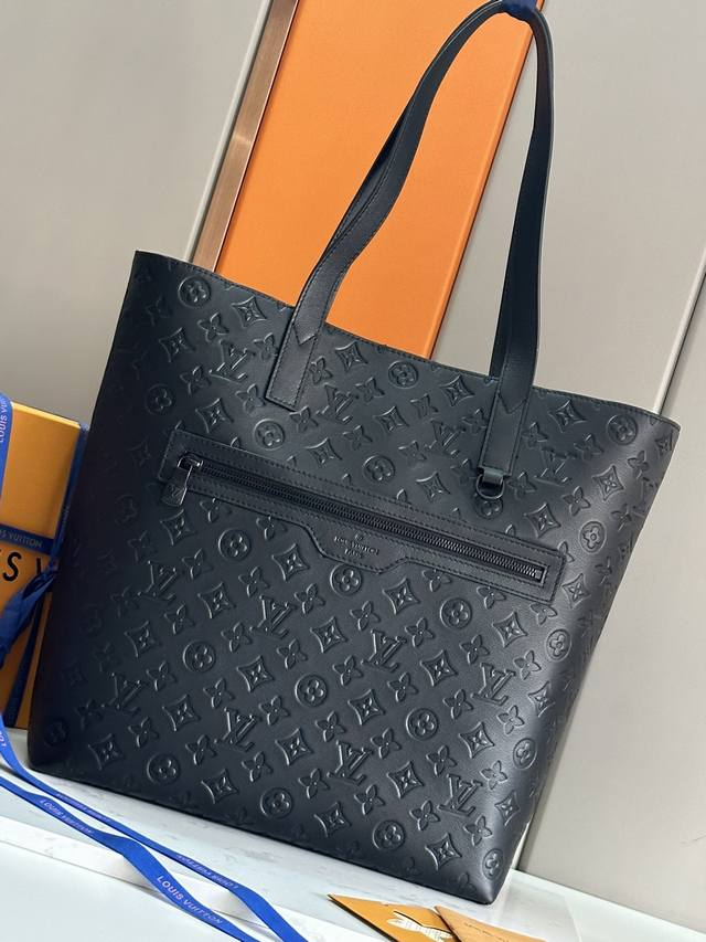 This Excursion Handbag Features A Lightweight Design With Ample Space To Accommo