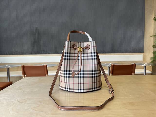 B's Latest Bucket Bag, Crafted From Large Checkered Leather With Stitched Edges,