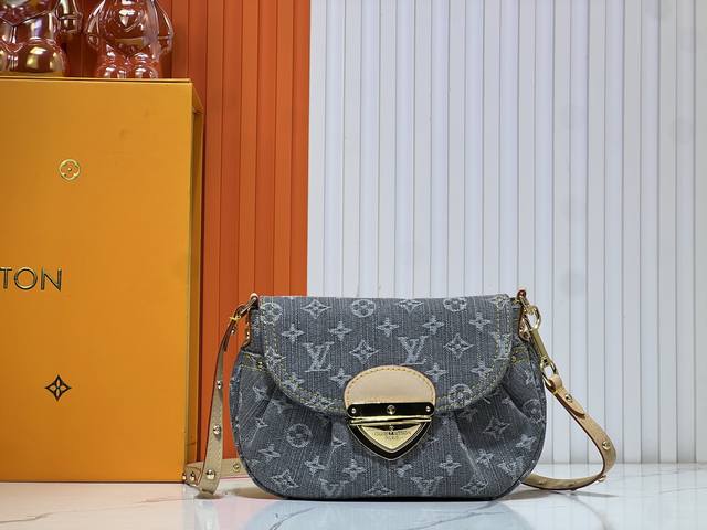 M46829 Gray Denim Sunset Handbag Highlights Monogram Denim Canvas. Crafted Throu