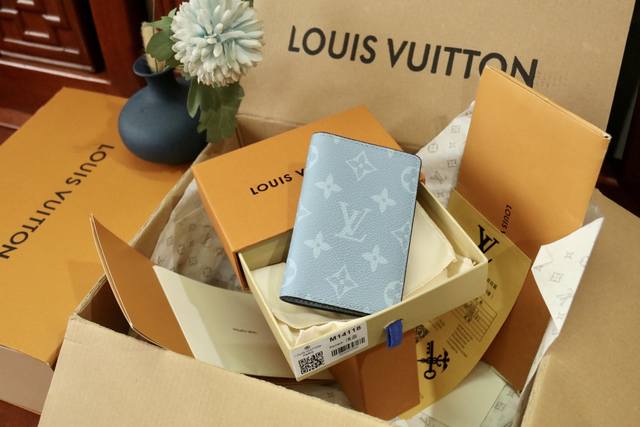 M14113 Card Holder Yellow This Pocket Wallet Is Crafted From Monogram Coated Can