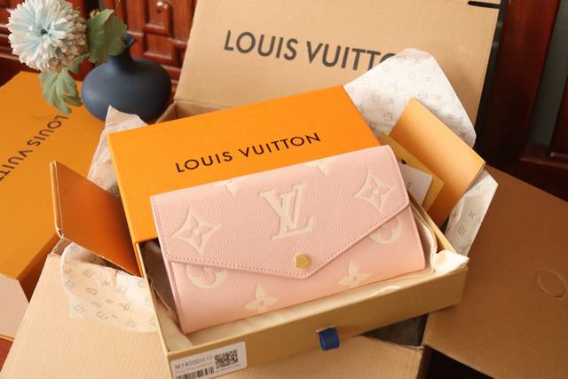 M14000 Pink The Louis Vuitton Monogram Pattern Is Beautifully Embossed On The Mo