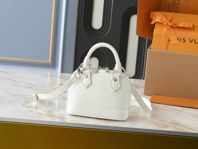 Upgraded From The Original M81945 M82411 M82717 This Nano Alma Handbag Is A Comp