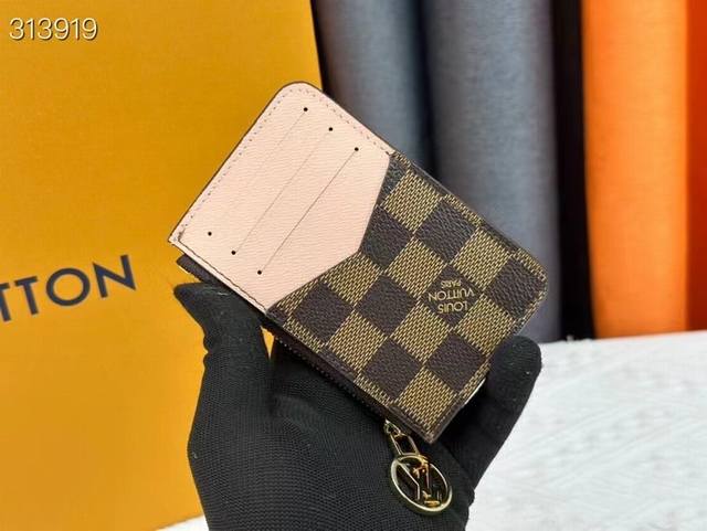 N81912 Romy Card Holder! The Romy Card Holder Combines The Functional Elements O