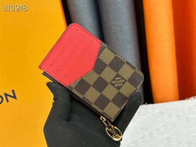 N81912 Romy Card Holder! The Romy Card Holder Combines The Functional Elements O
