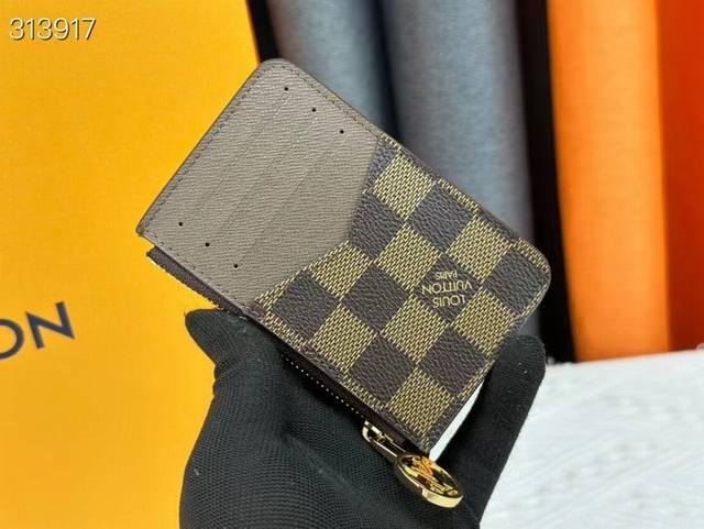 N81912 Romy Card Holder! The Romy Card Holder Combines The Functional Elements O