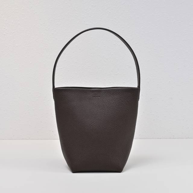 Upgraded Steel-Stamped Logo In Small Lychee Ebony Color, Tr Bucket Bag. The Leat