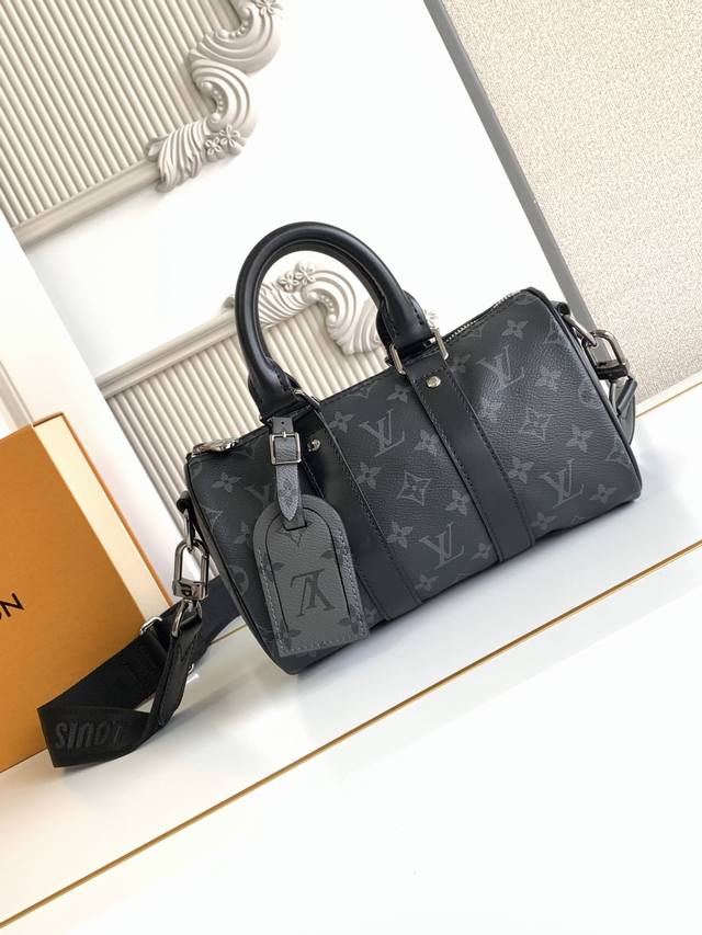 Premium This Handbag Is Crafted From Canvas, Reinterpreting Louis Vuitton's Clas