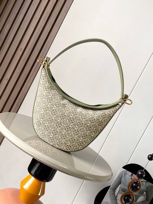 Genuine Leather Luna Half-Moon Hobo Handbag The Body Features Soft Lines, A Scul