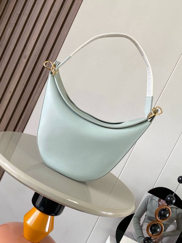 Genuine Leather Luna Half-Moon Hobo Handbag Features A Sleek Silhouette, Sculpte