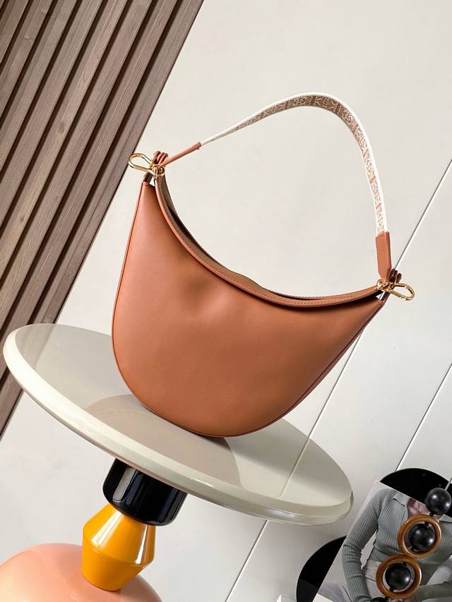 Genuine Leather Luna Half-Moon Hobo Handbag Features A Sleek Silhouette, Sculpte