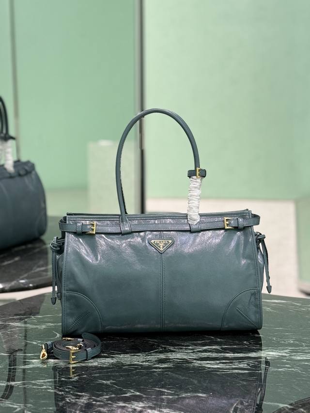 Softlux Oil-Waxed Leather Large This Handheld Crossbody Bag Is Made From Importe