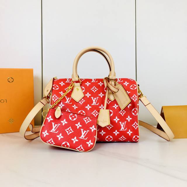 M24424,M24423 M24443 This Speedy P120 Bandouli Re 25 Monogram Leather Handbag Is