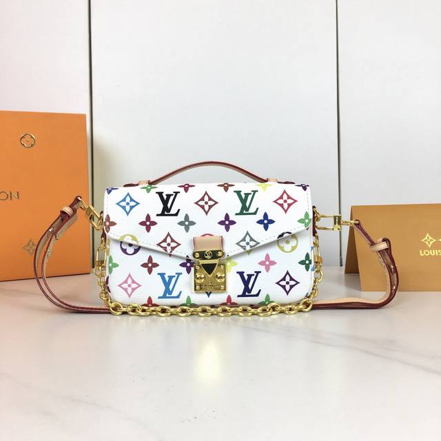 M46279 This Pochette M Tis East West Handbag Draws Inspiration From The Brand's