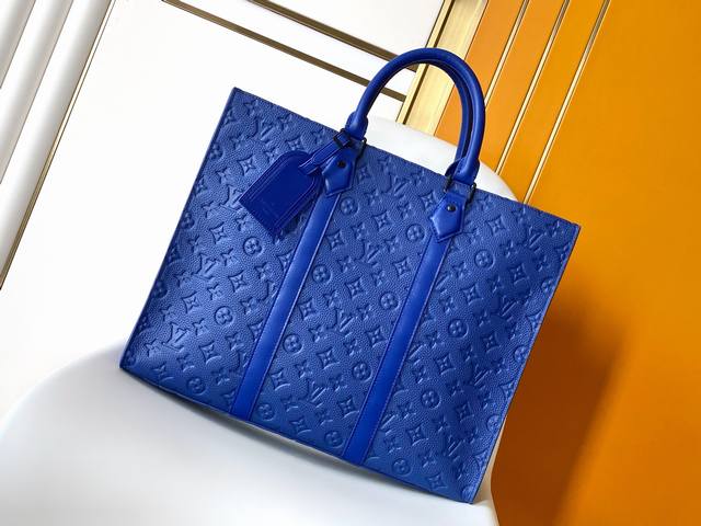 Variable-Code Chip M11690 Blue Embossed This Sac Plat 24H Handbag Is Crafted Fro