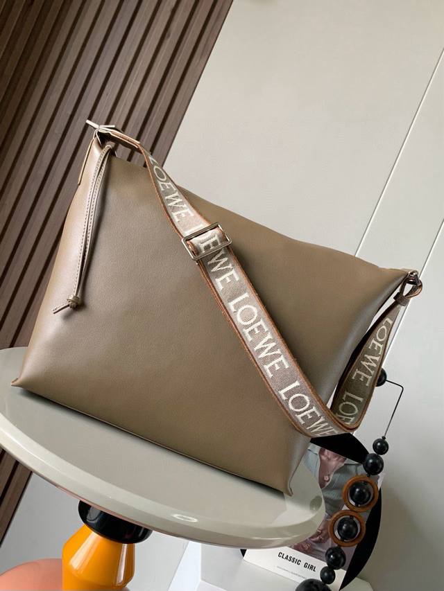 Cubi Crossbody Bag Makes A Stunning Debut The New Cubi Is A Delightful Surprise,