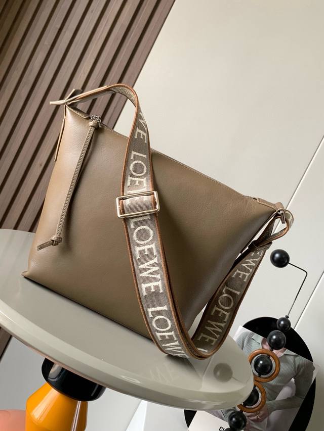 Small Cubi Crossbody Bag Makes A Stunning Debut The New Cubi Is A Delightful Sur