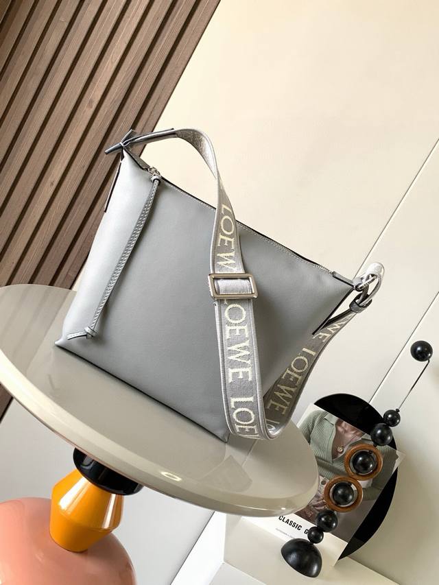 Small Cubi Crossbody Bag Makes A Stunning Debut The New Cubi Is A Delightful Sur
