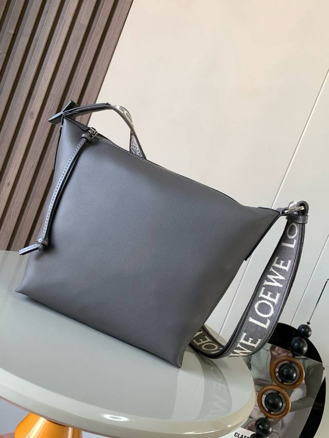 Small Cubi Crossbody Bag Makes A Stunning Debut The New Cubi Is A Delightful Sur