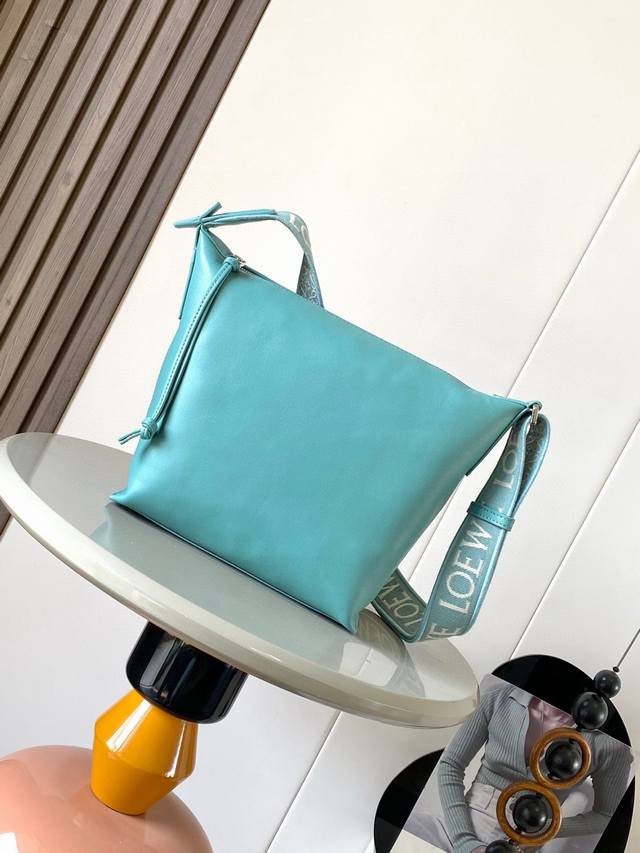Small Cubi Crossbody Bag Makes A Stunning Debut The New Cubi Is A Delightful Sur
