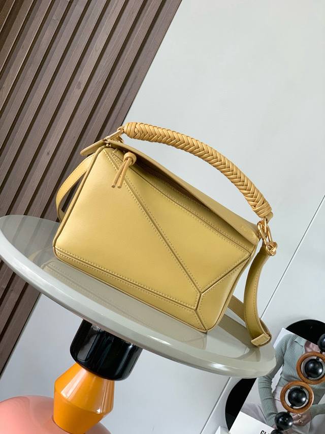 New Small Soft Calf Leather Puzzle Handbag Is The First Handbag Designed By Crea