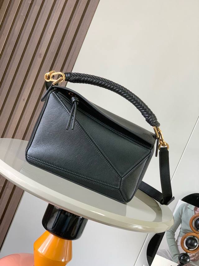 New Small Soft Calf Leather Puzzle Handbag Is The First Handbag Designed By Crea