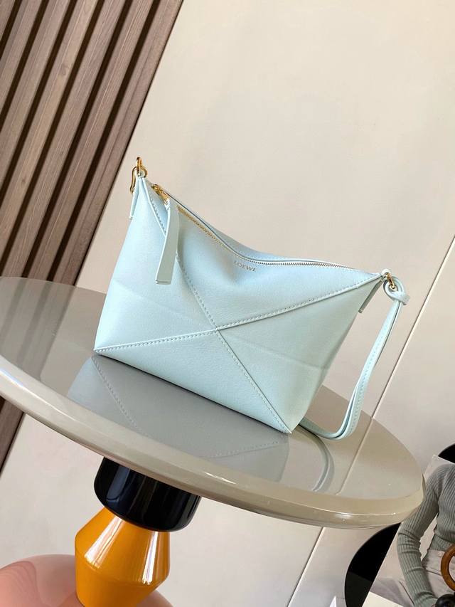New Puzzle Fold Handbag: A Reinterpretation Of The Practical And Versatile Handb