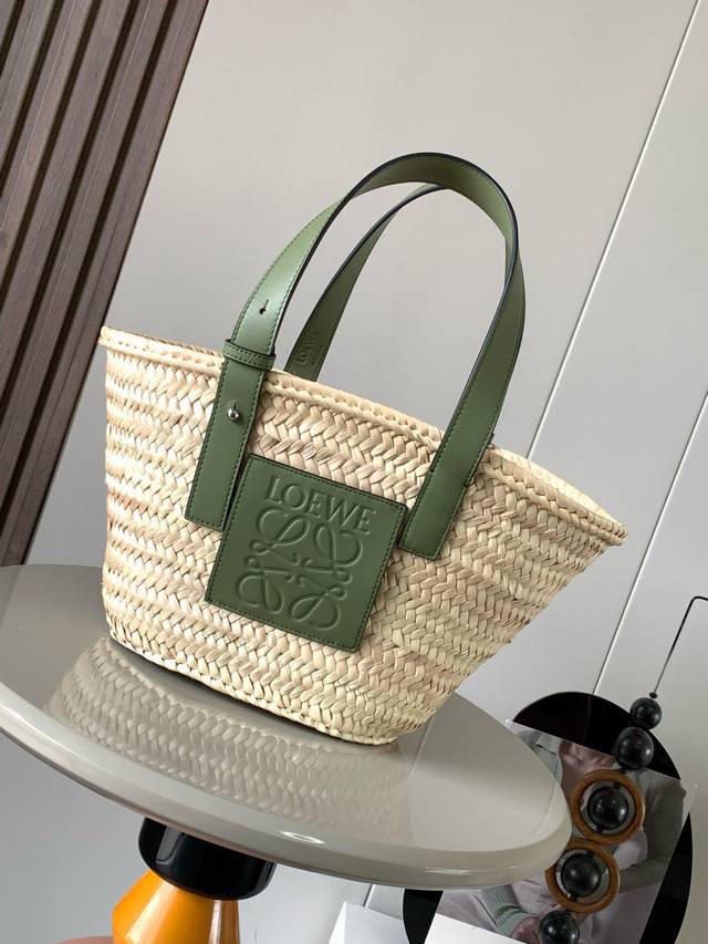 Model Number: 8004 Small Palm Leaf And Leather Basket Handbag A Traditional Bask