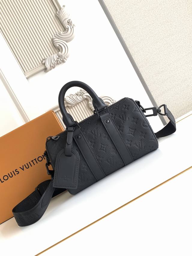 Premium This Handbag Is Crafted From Canvas, Reinterpreting Louis Vuitton's Clas
