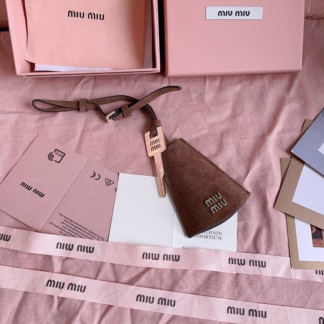 Authentic Grade 5Dn003: Miu M Earphone Mini Pendant. This Year's Miu M Bag Theme