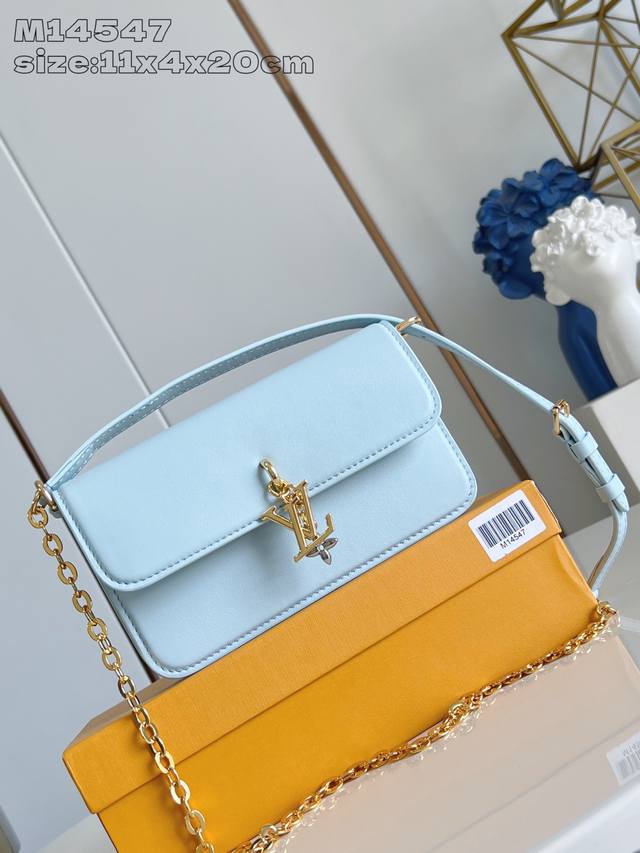 M14547 Blue This Wallet On Chain Handbag From The Louis Vuitton Lv Bloom Collect