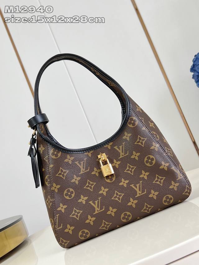 Top-Tier Authentic Replica M12940 This The Drop Small Handbag Draws Inspiration
