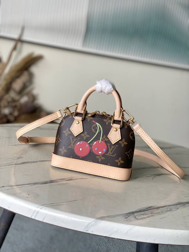 m13416 82717 Cherry This Compact Nano Alma Features A Playful Cherry Motif Fr