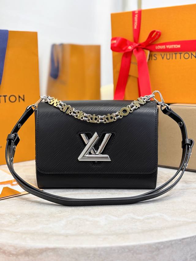 twist Medium Handbag M13118 Black This Twist Medium Handbag Is Made Of Iconic