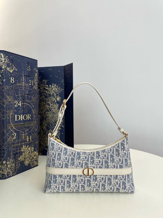 Dumpling Bag Miss Caro's Raffia Series Has A Summer Feel. The Sky Blue Fabric Is