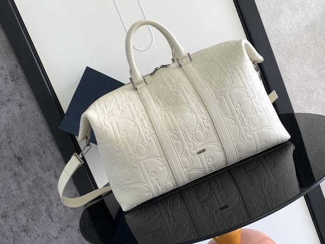 this Weekender 40 Bag Is Timeless And Elegant. Dior Gravity Print Leather Is