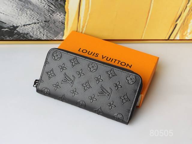 Color Black Size 20X10M81384 This Zippy Vertical Wallet Is Updated With Monogram