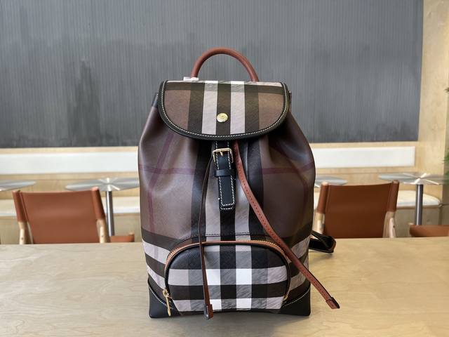 The New Backpack Adopts The Brand's Classic Plaid Pattern And Is Cleverly Matche