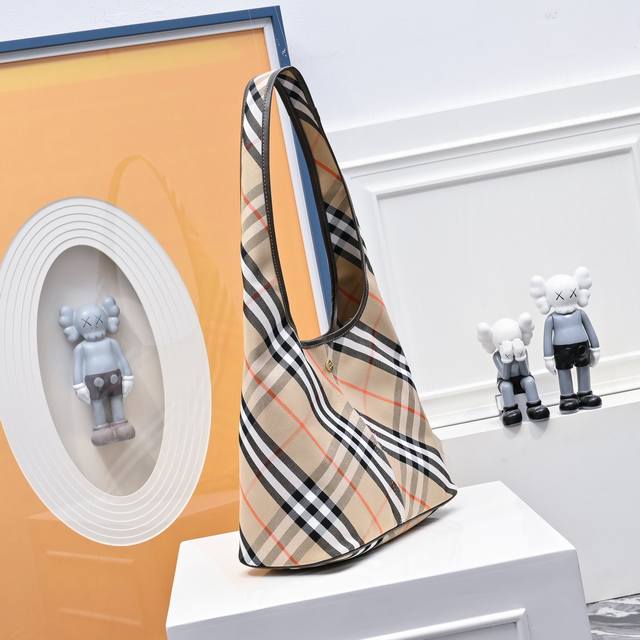 With Box. The New Hobo From Burberry Is So Pretty. I Am Totally Attracted To It.
