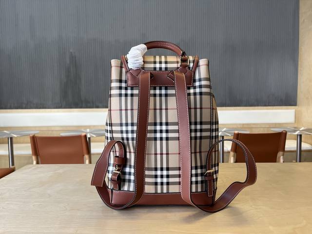 New Backpack Adopts The Brand's Classic Plaid Pattern With Bright Stitching Leat