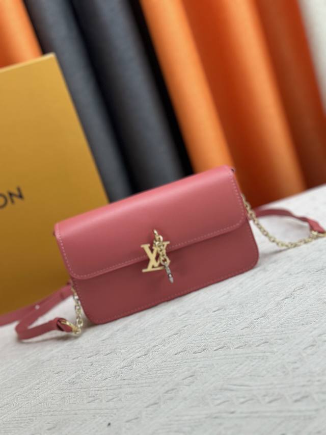Style No. M14564 This Wallet On Chain Bag Is From The Louis Vuitton Lv Bloom Col