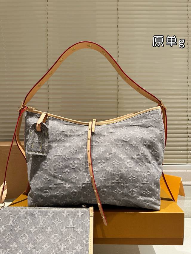 Grey Lv's New Denim Carryall Is So Cool The Grey Denim Carryall Was Just Release