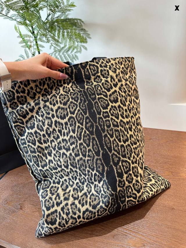 share The Saint Laurent Leopard Print Canvas Bag Is From My Favorite Brand In