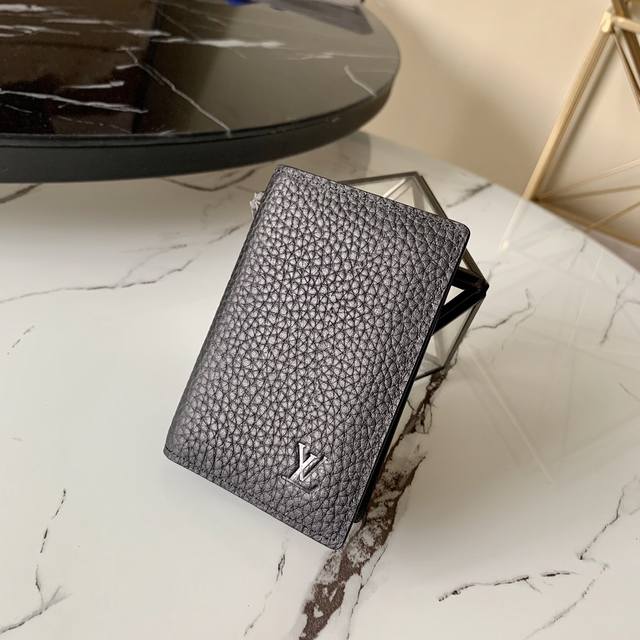 M14360 Blue This card holder in new Monogram Eclipse coated canvas is stylish an