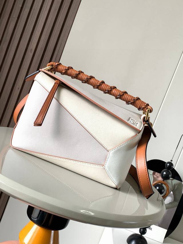 The latest London check briefcase from B&Q with leather trim. Carry it by hand o