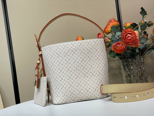 Lv's new Lv Iconic Lv earrings are infused with Monogram flowers to create an el