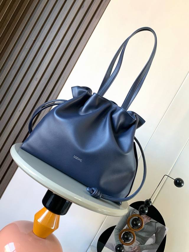 with folding box, perfect for spring and summer. Lv's new The Drop handbag is in