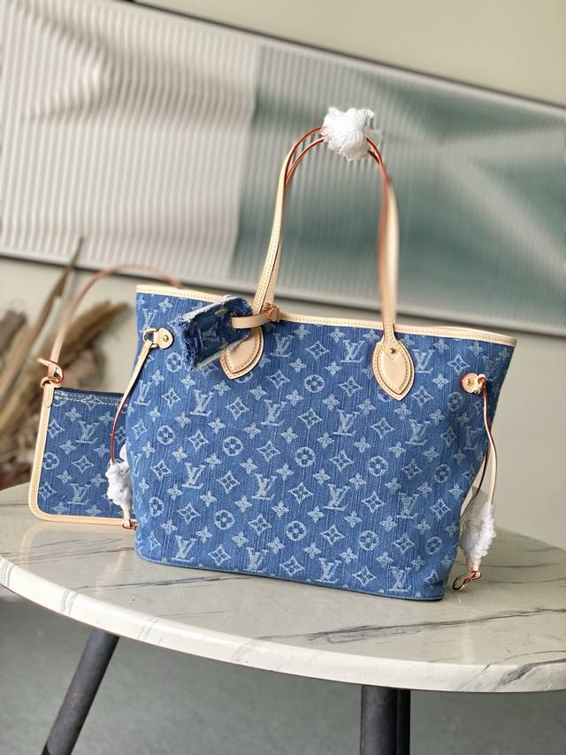 Top original M13192 This Neverfull medium handbag is made of Monogram denim with