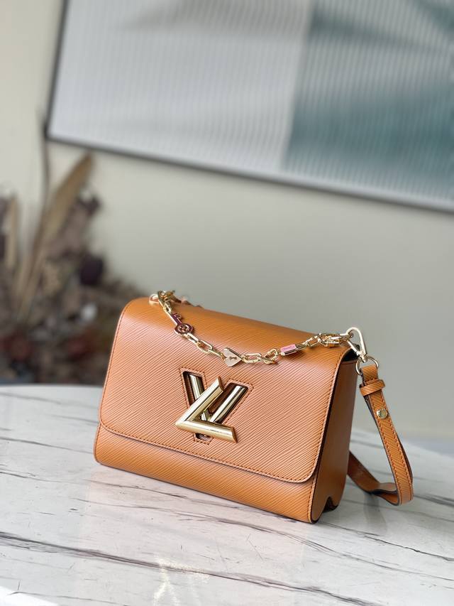Top-grade original leather M20846 Fuso Gold This medium Twist handbag is made of